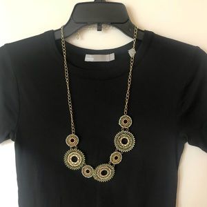 Woven string and metal long necklace